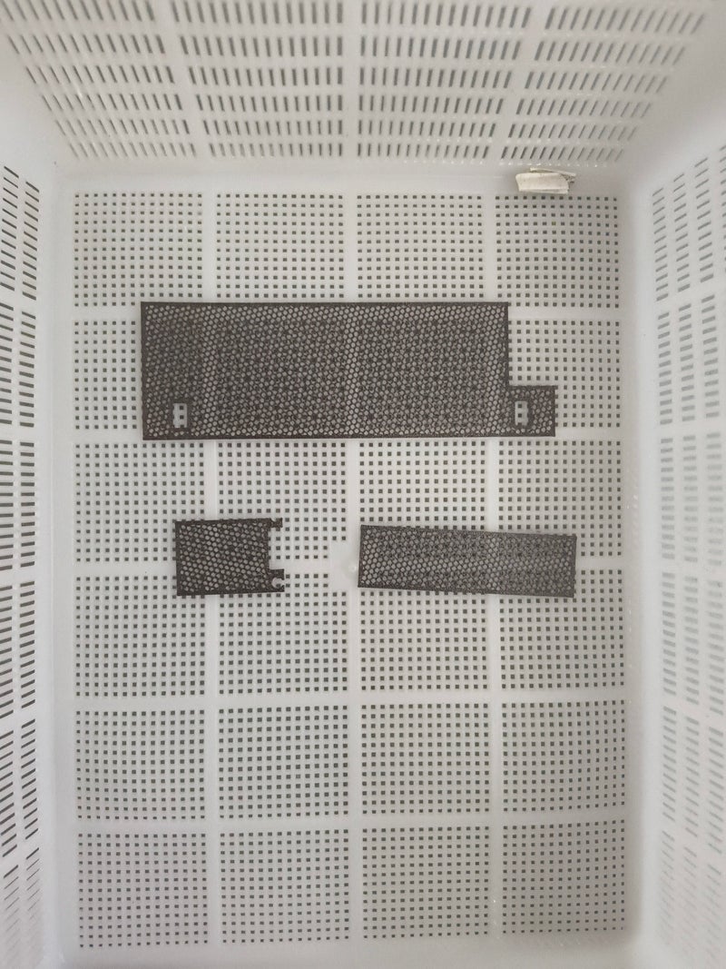 3D printed accessories for Legion Go modification: backplate for heat dissipation and dust protection.